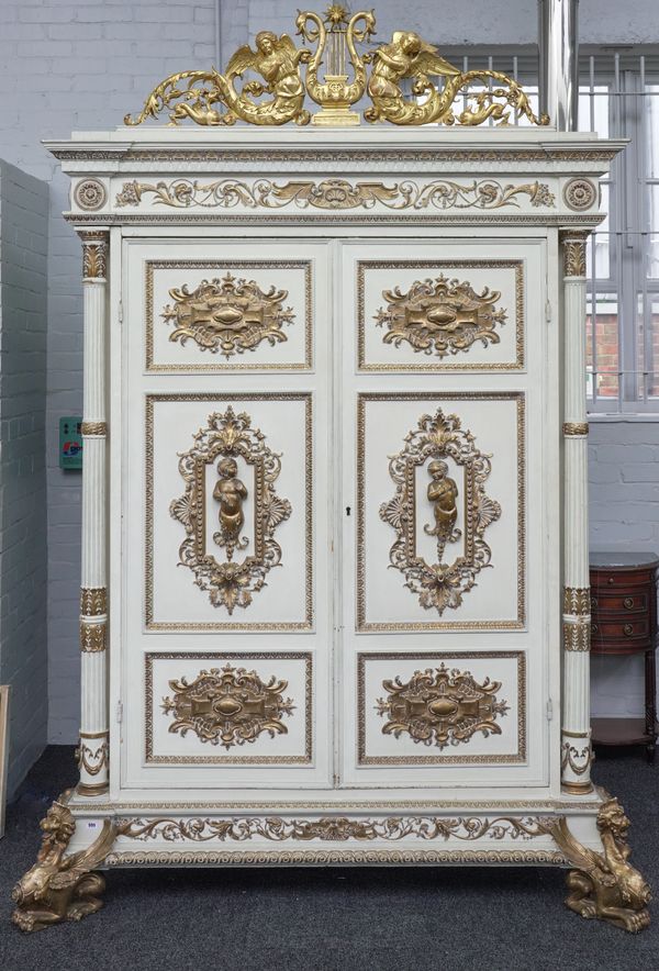 AN ITALIAN WHITE-PAINTED AND PARCEL-GILT WARDROBE