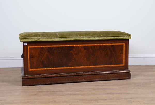 A LATE EDWARDIAN INLAID MAHOGANY LIFT TOP TRUNK