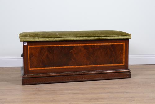 A LATE EDWARDIAN INLAID MAHOGANY LIFT TOP TRUNK