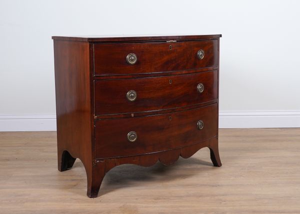 AN GEORGE III INLAID MAHOGANY BOWFRONT THREE DRAWER CHEST