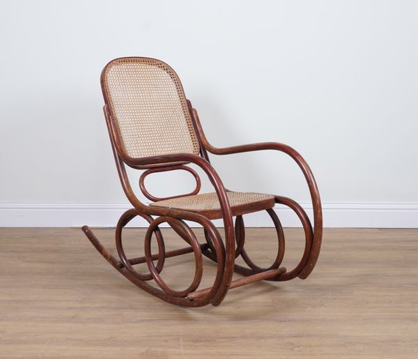 A MID-20TH CENTURY STAINED BEECH BENTWOOD ROCKING CHAIR