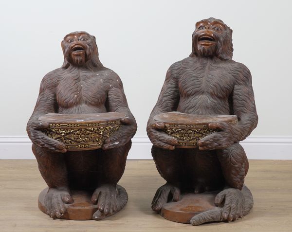 W. WINTEN BALI; TWO PARCEL GILT HARDWOOD SEATS, RELIEF CARVED AS MONKEYS HOLDING A DRUM (2)