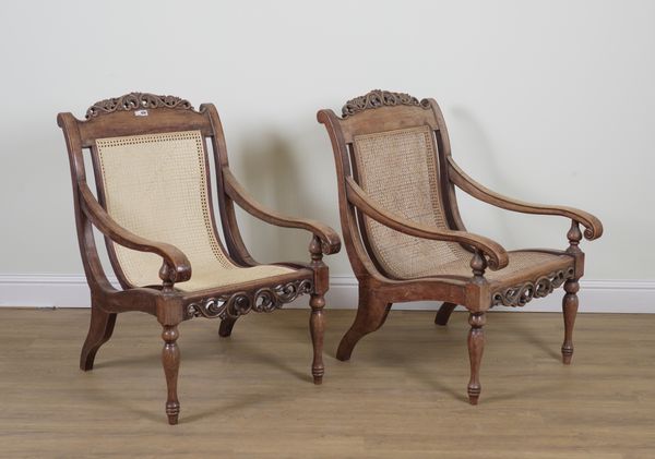 A PAIR OF 19TH CENTURY ANGLO-INDIAN HARDWOOD PLANTATION STYLE OPEN ARMCHAIRS (2)