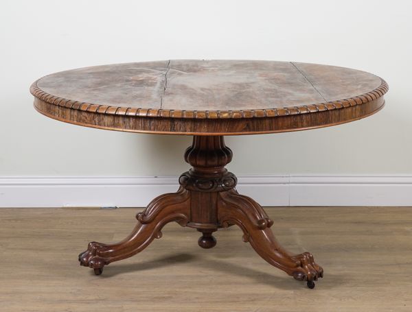 A VICTORIAN ROSEWOOD CIRCULAR SNAP TOP CENTRE TABLE