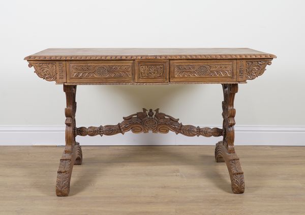 A 19TH CENTURY ANGLO-INDIAN CARVED HARDWOOD RECTANGULAR TWO DRAWER CENTRE TABLE