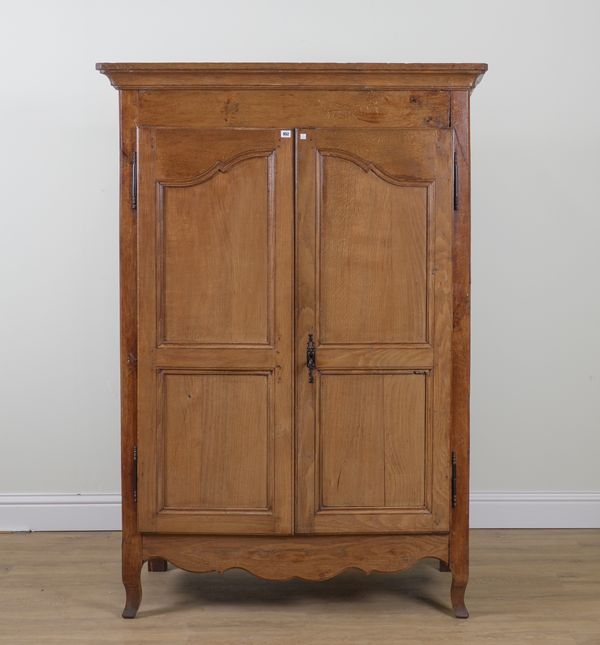 AN 18TH CENTURY FRENCH OAK TWO DOOR ARMOIRE