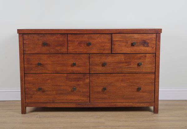 A MODERN HARDWOOD SEVEN DRAWER CHEST