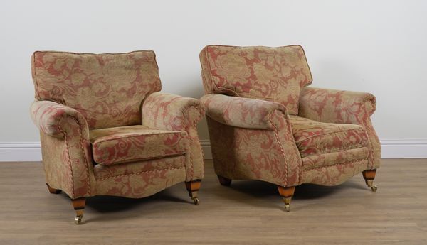 A PAIR OF FLORAL PRINT UPHOLSTERED SQUARE BACK EASY ARMCHAIRS (2)