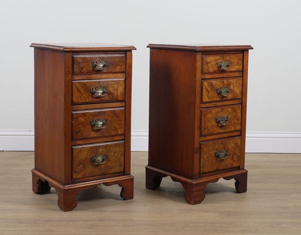 A PAIR OF WALNUT FOUR DRAWER BEDSIDE CHESTS (2)