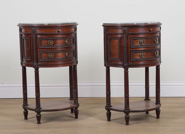 A PAIR OF GREY MARBLE TOPPED SEMI ELLIPTIC BED SIDE TABLES (2)