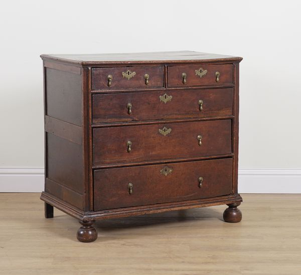 A QUEEN ANNE OAK FIVE DRAWER CHEST