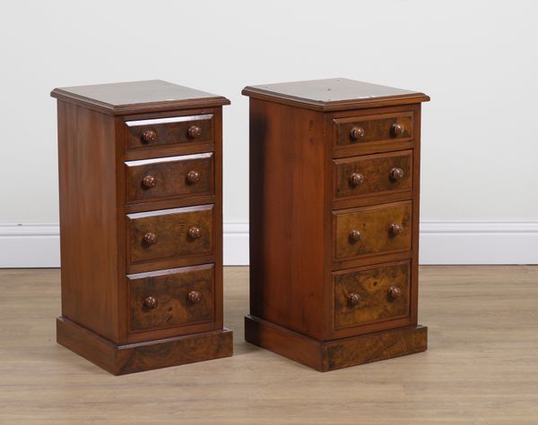 A PAIR OF FIGURED WALNUT FOUR DRAWER BEDSIDE CHESTS (2)