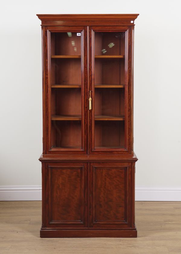 A LATE VICTORIAN MAHOGANY GLAZED BOOKCASE CABINET