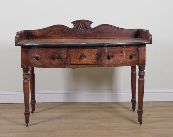 A WILLIAM IV EBONY BANDED MAHOGANY BOWFRONT SERVING TABLE