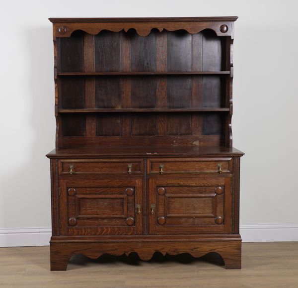 A CHARLES  II STYLE OAK DRESSER