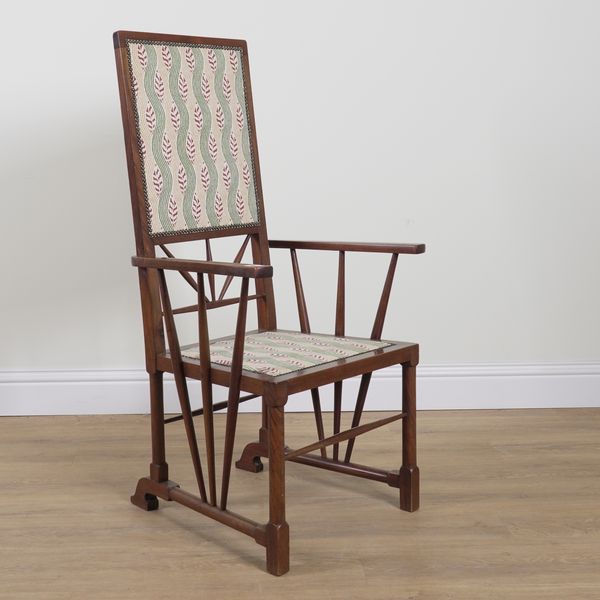 IN THE MANNER OF E W GODWIN, AN ARTS AND CRAFTS MAHOGANY STICKBACK OPEN ARMCHAIR