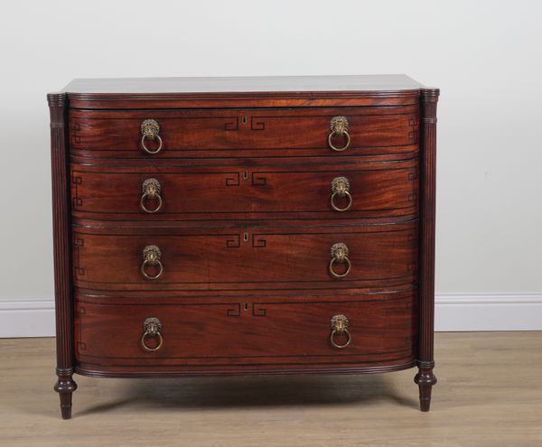 A REGENCY INLAID MAHOGANY BOWFRONT FOUR DRAWER CHEST