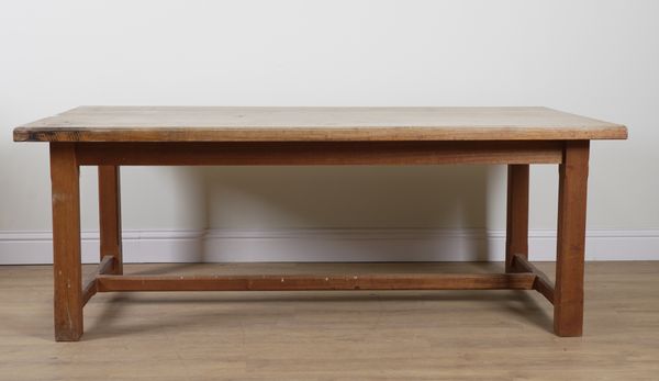 A BLEACHED MAHOGANY PLANK TOPPED KITCHEN TABLE