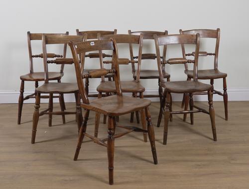 A MATCHED SET OF EIGHT VICTORIAN ELM SEATED SCROLL BACK CHAIRS (8)