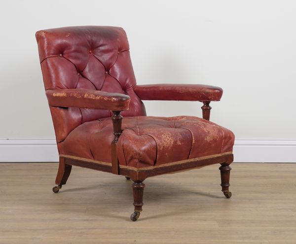 GILLOWS; A 19TH CENTURY BUTTON ROUGE LEATHER UPHOLSTERED OPEN ARMCHAIR