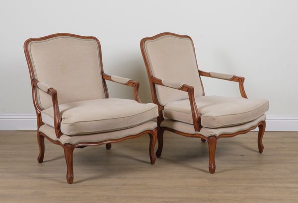 A PAIR OF MODERN FRENCH STAINED BEECH OPEN ARMCHAIRS (2)