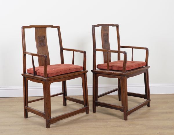 A PAIR OF EARLY 20TH CENTURY CHINESE EXPORT HARDWOOD OPEN ARMCHAIRS (2)