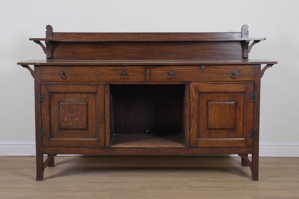 AN ARTS AND CRAFTS OAK SIDEBOARD