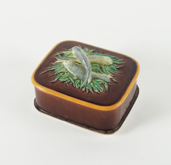 A MINTON MAJOLICA SARDINE BOX AND COVER (2)