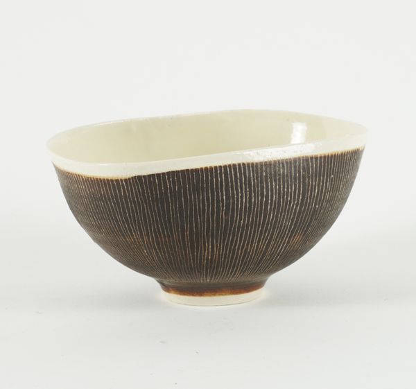 DAME LUCIE RIE (1902-1995) AN OBLONG SHAPED PORCELANEOUS BOWL