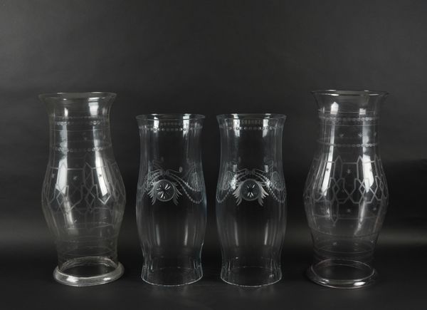 TWO SETS OF FOUR GLASS STORM SHADES (8)