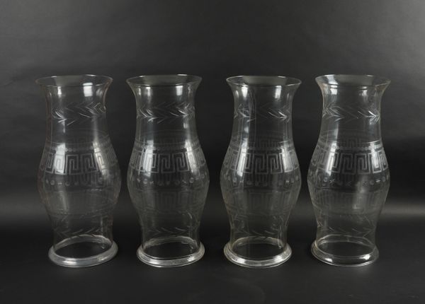 A SET OF FOUR GLASS STORM SHADES (4)