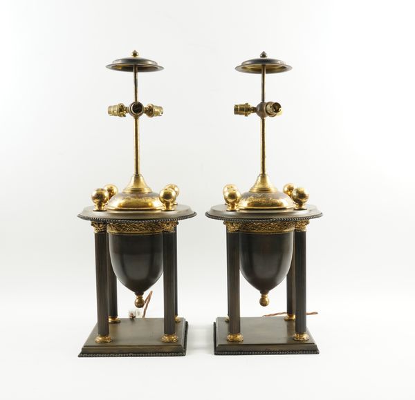 A PAIR OF NEO-CLASSICAL STYLE PATINATED AND GILT MOUNTED METAL TABLE LAMPS (2)