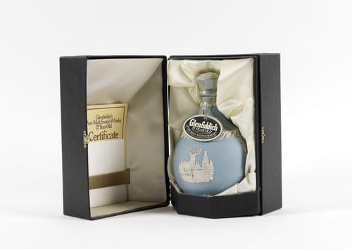 A BOTTLE OF 21 YEAR OLD GLENFIDDICH IN A WEDGWOOD DECANTER
