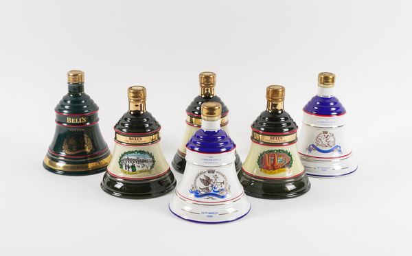 A COLLECTION OF BELLS WHISKY DECANTERS INCLUDING COMMEMORATING THE BIRTH OF PRINCESS BEATRICE (18)