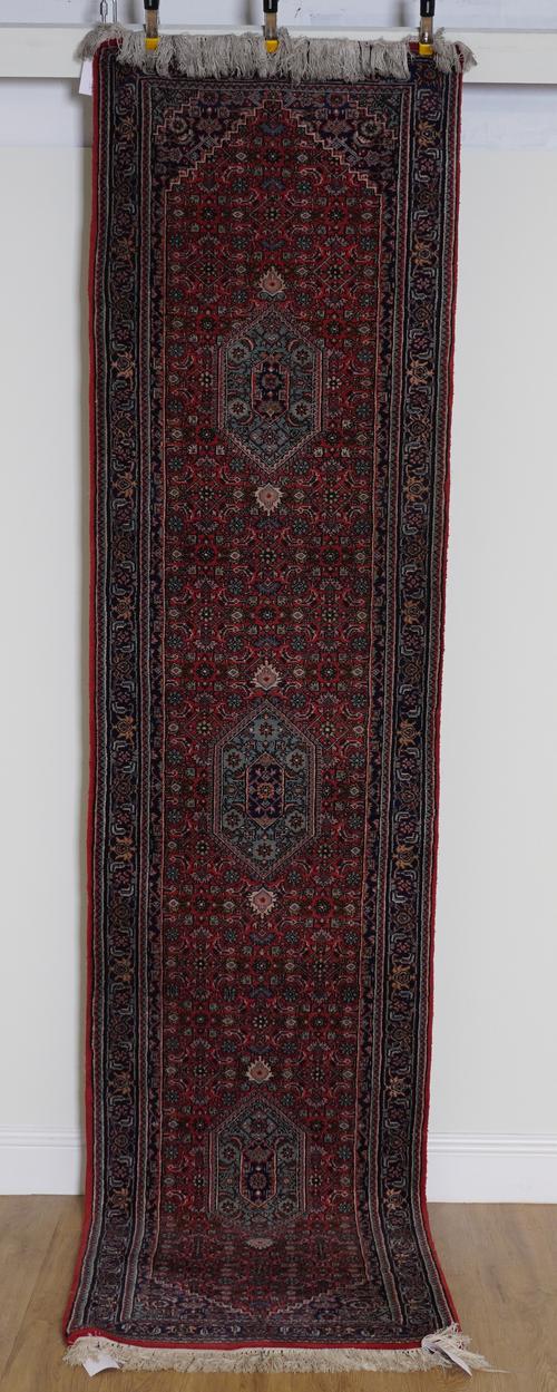 AN INDIAN RUNNER OF PERSIAN DESIGN