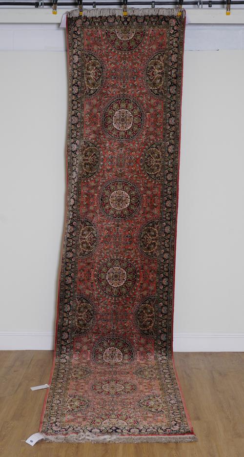 A SILK QUM RUG, PERSIAN