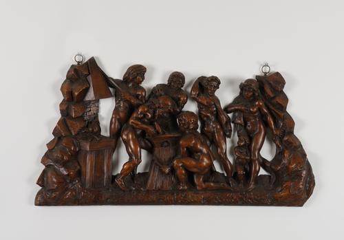 A CONTINENTAL RELIEF CARVED WALNUT FRIEZE DEPICTING FIGURES AT A FORGE (4)