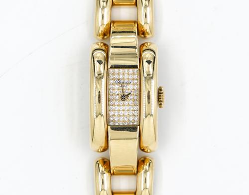 CHOPARD LA STRADA. A LADY'S 18CT GOLD AND PAVE DIAMOND DIAL WRISTWATCH