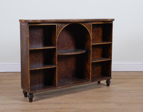 A REGENCY POLYCHROME PAINTED SERPENTINE TOP OPEN BOOKCASE