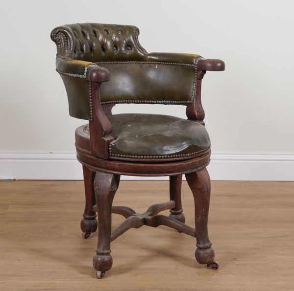 A VICTORIAN OAK FRAMED DESK CHAIR