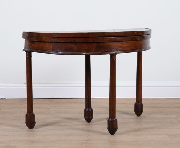 A 19TH CENTURY FRENCH MAHOGANY DEMI LUNE FOLDOVER CARD TABLE