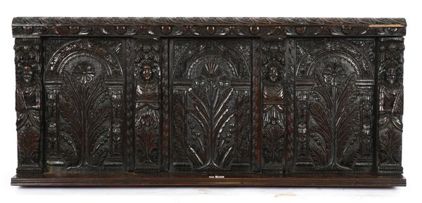 A 17TH CENTURY AND LATER CARVED OAK WALL PANEL