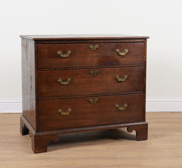 A 19TH CENTURY OAK CHEST OF THREE DRAWERS