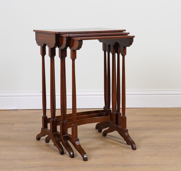 A LATE 19TH CENTURY MAHOGANY NEST OF THREE TABLES (3)