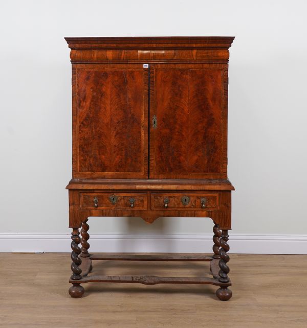 A GEORGE I WALNUT CABINET ON ASSOCIATED STAND