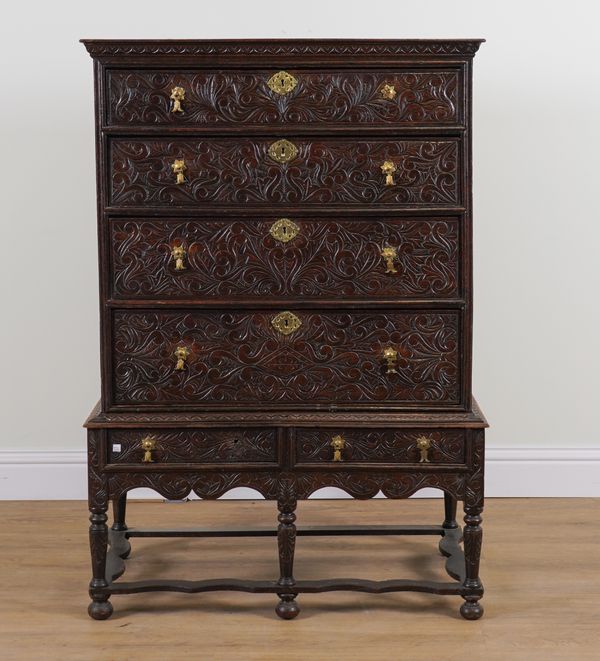 AN 18TH CENTURY AND LATER OAK CHEST OF FOUR LONG DRAWERS