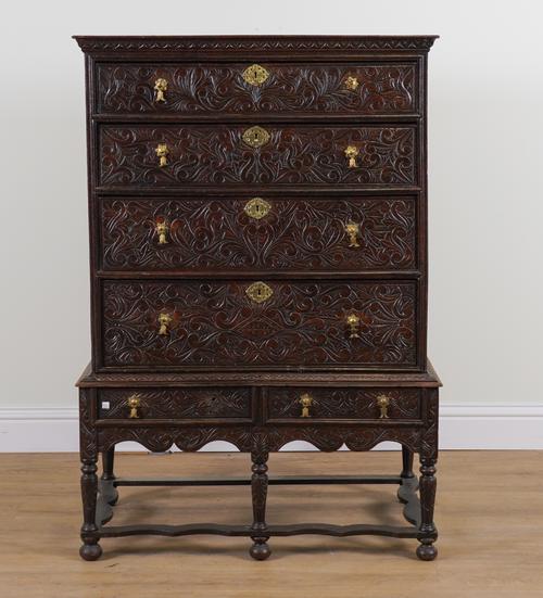 AN 18TH CENTURY AND LATER OAK CHEST OF FOUR LONG DRAWERS