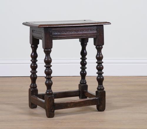A 17TH CENTURY AND LATER OAK JOINT STOOL