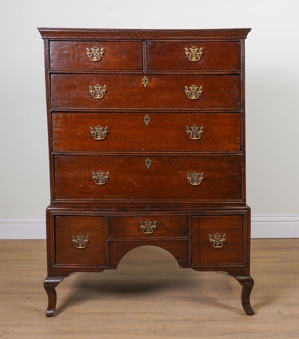 AN EARLY 18TH CENTURY OAK FIVE DRAWER CHEST ON STAND