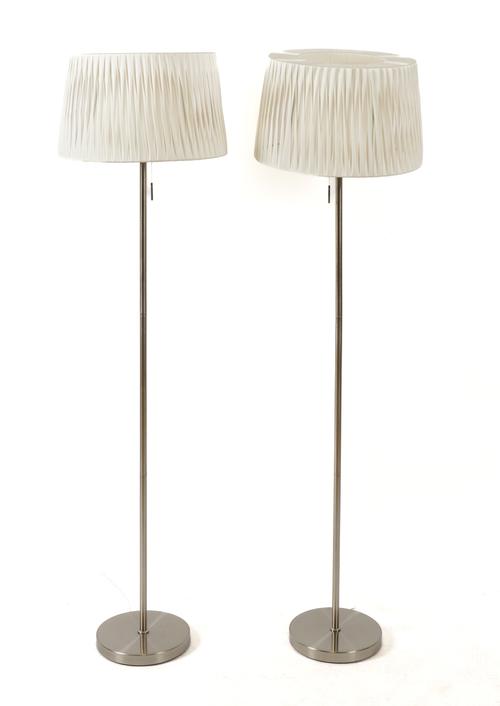 A PAIR OF MODERN BRUSHED STEEL FLOOR LAMPS (2)